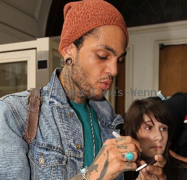 Travis McCoy of Gym Class Heroes leaving Radio 1's Live Lounge after promoting his new solo single, Billionaire 
London, England.