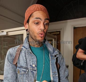 Travis McCoy of Gym Class Heroes leaving Radio 1's Live Lounge after promoting his new solo single, Billionaire 
London, England.