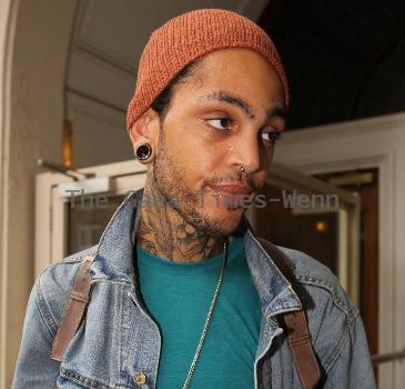 Travis McCoy of Gym Class Heroes leaving Radio 1's Live Lounge after promoting his new solo single, Billionaire 
London, England.