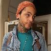 Travis McCoy of Gym Class Heroes leaving Radio 1's Live Lounge after promoting his new solo single, Billionaire 
London, England.