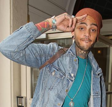 Travis McCoy of Gym Class Heroes leaving Radio 1's Live Lounge after promoting his new solo single, Billionaire 
London, England.