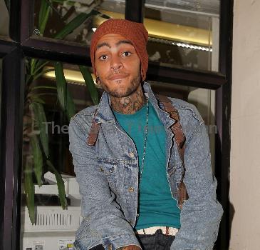 Travis McCoy of Gym Class Heroes leaving Radio 1's Live Lounge after promoting his new solo single, Billionaire 
London, England.