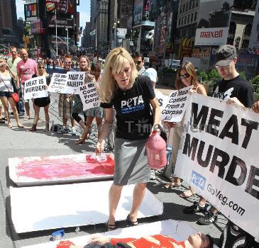 PETA Members show Manhattan that 'we're all made of flesh' at their latest demonstration 'Naked and Wrapped in Cellophane' held at the Times Square intersection, 45th and Broadway New York City.