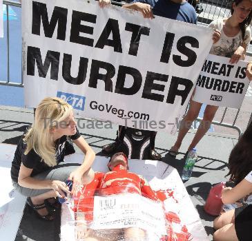 PETA Members show Manhattan that 'we're all made of flesh' at their latest demonstration 'Naked and Wrapped in Cellophane' held at the Times Square intersection, 45th and Broadway New York City.