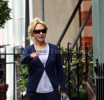 Felicity Kendal 
takes her dog for a walk near her home. The actress has been keeping in good shape after it was announced she will be taking part in the new series of 'Strictly Come Dancing'.
London, England.