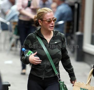 Anastacia looking red in the face as she leaves a Bikram Yoga studio in Richmond after a work out.  The American singer-songwriter, who is currently hosting Channel Five's 'Don't Stop Believing', was then seen heading to a supermarket where she did a food shop.
London, England.