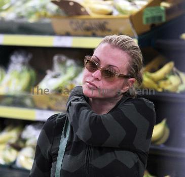Anastacia looking red in the face as she leaves a Bikram Yoga studio in Richmond after a work out.  The American singer-songwriter, who is currently hosting Channel Five's 'Don't Stop Believing', was then seen heading to a supermarket where she did a food shop.
London, England.