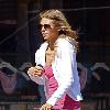 AnnaLynne McCord wearing a white Juicy Couture velour tracksuit leaving a hair salon in West Hollywood Los Angeles.