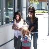 Rachel Bilson
on babysitting duty as she takes some children to Johnny Rocket's diner.
Los Angeles, California.