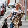 Kerry Katonaloads her car after leaving her mum's houseWarrington.