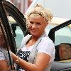 Kerry Katonaloads her car after leaving her mum's houseWarrington.