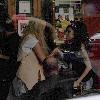 Mischa Barton and Amy Winehouse greeting each other in the Hawley Arms pub in Camden London.