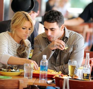 Ali Fedotowsky and Roberto Martinezare seen having lunch together at the Newsroom cafe. Los Angeles.