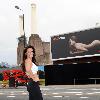 Kelly Brook arrives to unveil a billboard featuring her posing nude for Reebok's EasyTone trainers outside Battersea Power Station.
London, England.