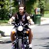 Dean McDermott
 riding his Triumph motorcycle outside his house
Los Angeles, California.