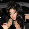 Amy Winehouse shows a bit more than she may have intended, as she arrives at the opening of Shaka Zulu bar, in Camden with her boyfriend Reg Traviss
London, England.