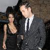 Amy Winehouse shows a bit more than she may have intended, as she arrives at the opening of Shaka Zulu bar, in Camden with her boyfriend Reg Traviss
London, England.