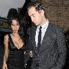 Amy Winehouse shows a bit more than she may have intended, as she arrives at the opening of Shaka Zulu bar, in Camden with her boyfriend Reg Traviss
London, England.