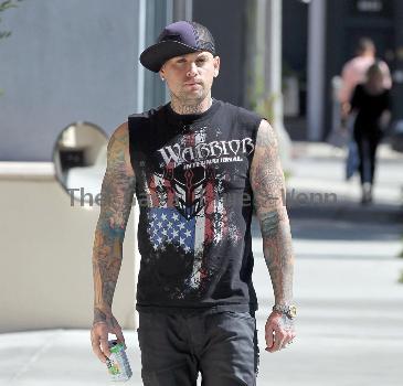 Benji Madden
 of the rock band 'Good Charlotte', wearing a sleeveless shirt showing off his tattoos
Los Angeles, California.