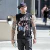 Benji Madden
 of the rock band 'Good Charlotte', wearing a sleeveless shirt showing off his tattoos
Los Angeles, California.