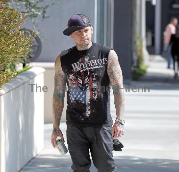 Benji Madden
 of the rock band 'Good Charlotte', wearing a sleeveless shirt showing off his tattoos
Los Angeles, California.