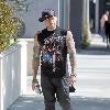 Benji Madden
 of the rock band 'Good Charlotte', wearing a sleeveless shirt showing off his tattoos
Los Angeles, California.