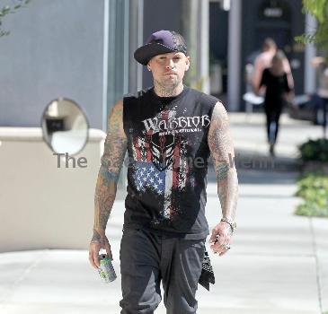 Benji Madden
 of the rock band 'Good Charlotte', wearing a sleeveless shirt showing off his tattoos
Los Angeles, California.