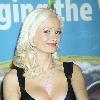 Holly  Madison 
attending the World Shoes & Accessories Convention signing autographs at the