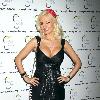 Holly  Madison 
attending the World Shoes & Accessories Convention signing autographs at the