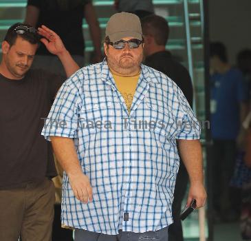 Jorge Garcia out shopping at the apple store at the grove.

* WEEZER DEBUT 'HURLEY' ALBUM ARTWORK
Rockers WEEZER have picked a picture of LOST star JORGE GARCIA to grace the cover of their next album, HURLEY.
Frontman Rivers Cuomo admits the band struggled to come up with a title and accompanying image for their eighth album - until they settled on a photo of the larger-than-life actor, who played Hurley on the desert island series.
Cuomo explains,