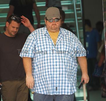 Jorge Garcia out shopping at the apple store at the grove.

* WEEZER DEBUT 'HURLEY' ALBUM ARTWORK
Rockers WEEZER have picked a picture of LOST star JORGE GARCIA to grace the cover of their next album, HURLEY.
Frontman Rivers Cuomo admits the band struggled to come up with a title and accompanying image for their eighth album - until they settled on a photo of the larger-than-life actor, who played Hurley on the desert island series.
Cuomo explains,