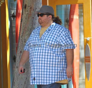 Jorge Garcia out shopping at the apple store at the grove.

* WEEZER DEBUT 'HURLEY' ALBUM ARTWORK
Rockers WEEZER have picked a picture of LOST star JORGE GARCIA to grace the cover of their next album, HURLEY.
Frontman Rivers Cuomo admits the band struggled to come up with a title and accompanying image for their eighth album - until they settled on a photo of the larger-than-life actor, who played Hurley on the desert island series.
Cuomo explains,