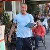 Comedian Dov Davidoff 
out shopping carrying a notebook jotting down new material for his stand up comedy
Hollywood, California.