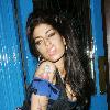 Amy Winehouse appears a little worse for wear outside a pub in London after watching the newly reformed Libertines perform a gig at the nearby HMV Forum
London, England.