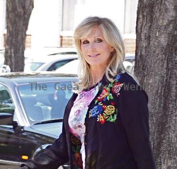 Morgan Fairchild 
walking in Beverly Hills wearing a black sweater
Los Angeles, California.