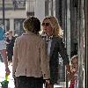 Geri Halliwell with Bluebell Madonna after lunch at a restaurant. Geri sporting a grey blazer, shirt and tie, shorts and boots, as she strolls about with her daughter in central London. London.