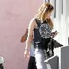 Hilary Duff newlywed arriving at a pilates studio in Toluca Lake wearing a peace sign t-shirt Los Angeles.