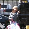 Kelly Osbourne is seen with a shopping bag as she heads to the Viper Room to see the Pussycat Dolls perform. Los  Angeles.