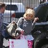 Kelly Osbourne is seen with a shopping bag as she heads to the Viper Room to see the Pussycat Dolls perform. Los  Angeles.