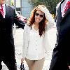 Eva Longoria is seen in good spirits as she arrives at Heathrow Airport. London.