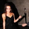 Victoria Beckham is seen arriving at Gordon Ramsay's restaurant Maze in a sexy black cocktail dress.London.