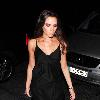 Victoria Beckham is seen arriving at Gordon Ramsay's restaurant Maze in a sexy black cocktail dress.London.