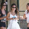 Rachel Bilson, wearing a white summary dress and sunglasses, is seen shopping at Nature Mart in Los Feliz Los Angeles.