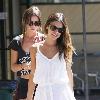 Rachel Bilson, wearing a white summary dress and sunglasses, is seen shopping at Nature Mart in Los Feliz Los Angeles.