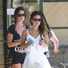 Rachel Bilson, wearing a white summary dress and sunglasses, is seen shopping at Nature Mart in Los Feliz Los Angeles.