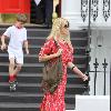 Claudia Schiffer 
looking fantastic in a summer dress, after dropping her children off at school. The supermodel has shifted the baby weight after delivering her third child in May.
London, England.