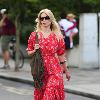 Claudia Schiffer 
looking fantastic in a summer dress, after dropping her children off at school. The supermodel has shifted the baby weight after delivering her third child in May.
London, England.