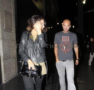 Shenae Grimes 
covers her face as she leaves Katsuya restaurant with a  friend
Los Angeles, California.