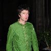 Noel Gallagher wearing a bright green jacket, arrives back at the Radisson Edwardian Hotel after watching Blue Moon Rising Premier
Manchester, England.