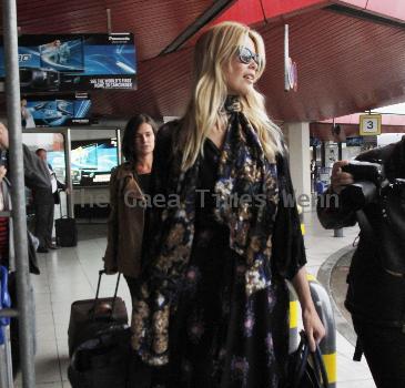 Claudia Schiffer arriving at Tegel Airport after flying in from London for the Vogue Berlin Fashion Night Out. Berlin.